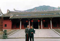 Master Tham (when he was young) with his master studying the wonderful Feng Shui at a well known temple in China.